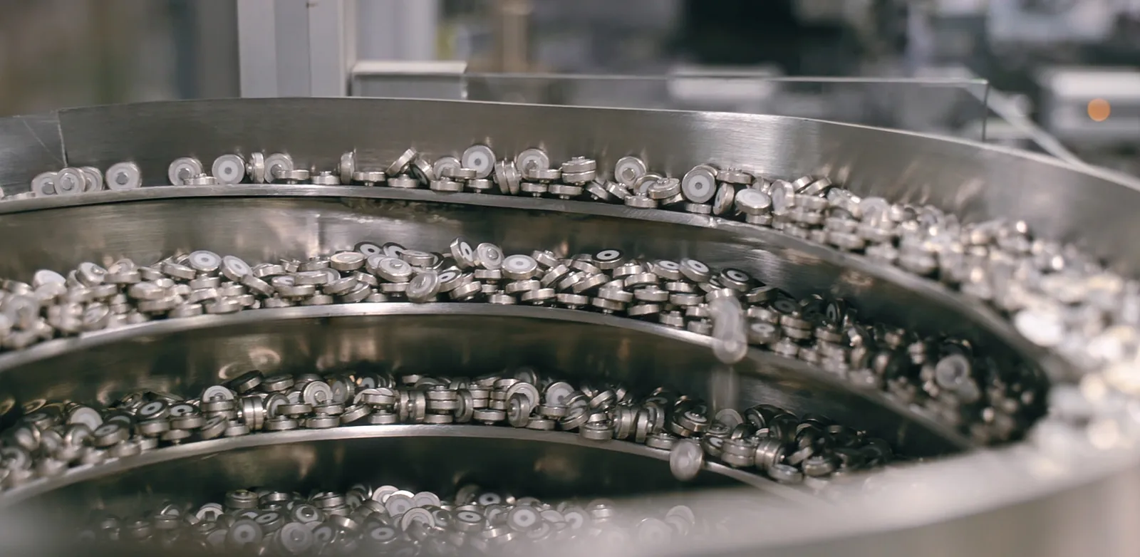Initiator header components in a vibratory feeder bowl
